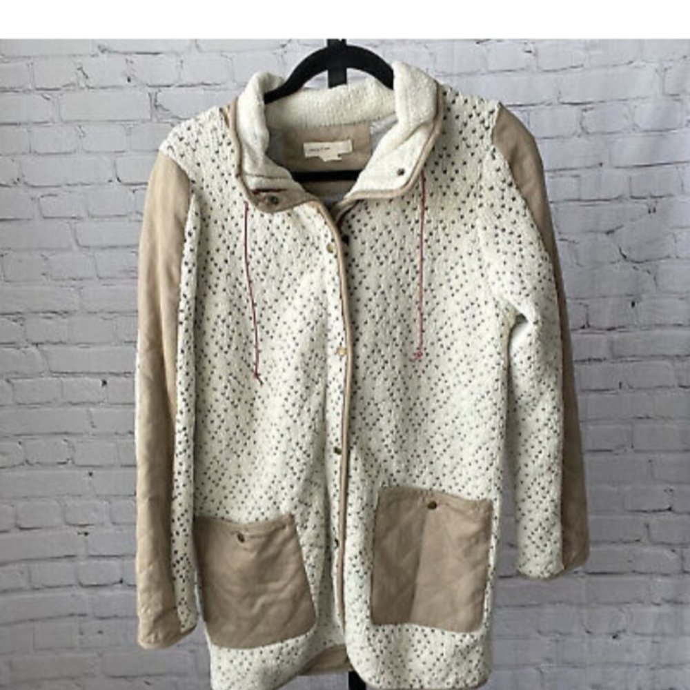 Anthropology sleeping on snow jacket
